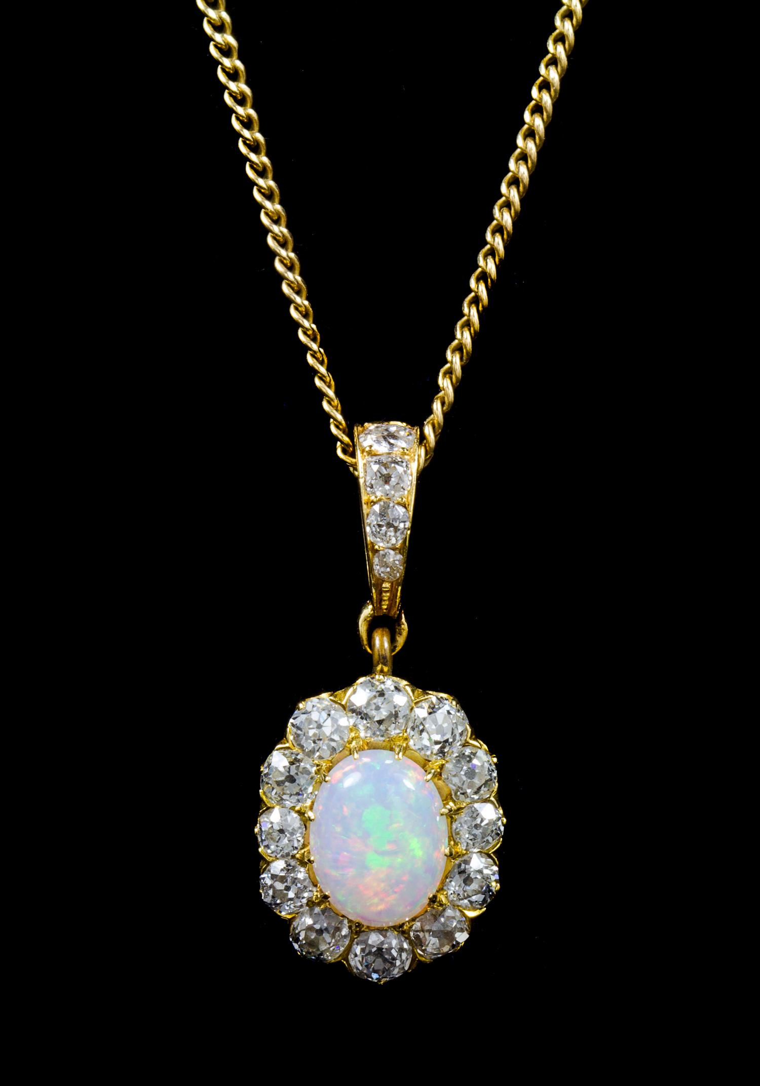 An Edwardian Yellow Gold, Opal and Diamond Pendant, 5.50 dwts.