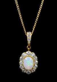 An Edwardian Yellow Gold, Opal and Diamond Pendant, 5.50 dwts.