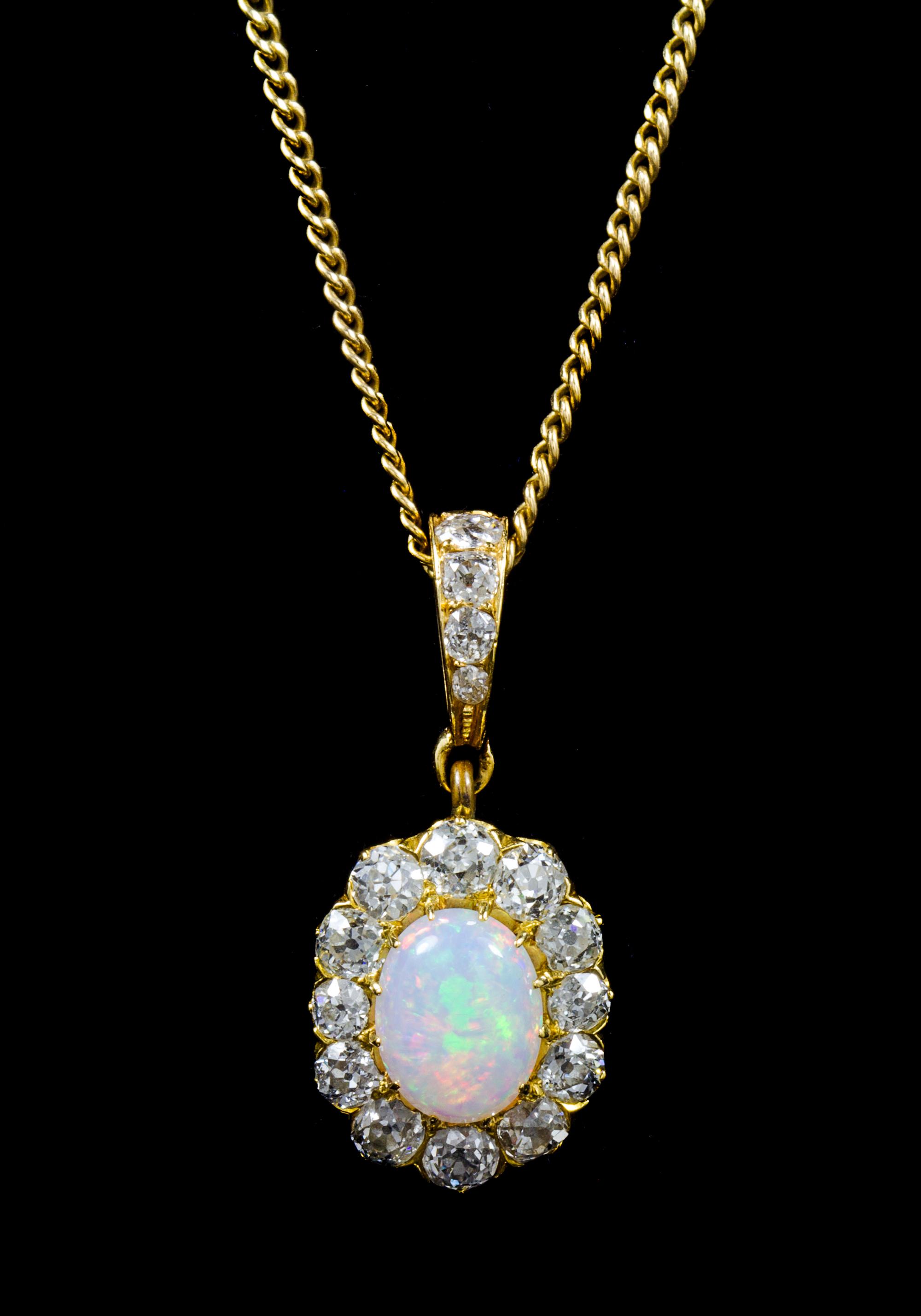 An Edwardian Yellow Gold, Opal and Diamond Pendant, 5.50 dwts.