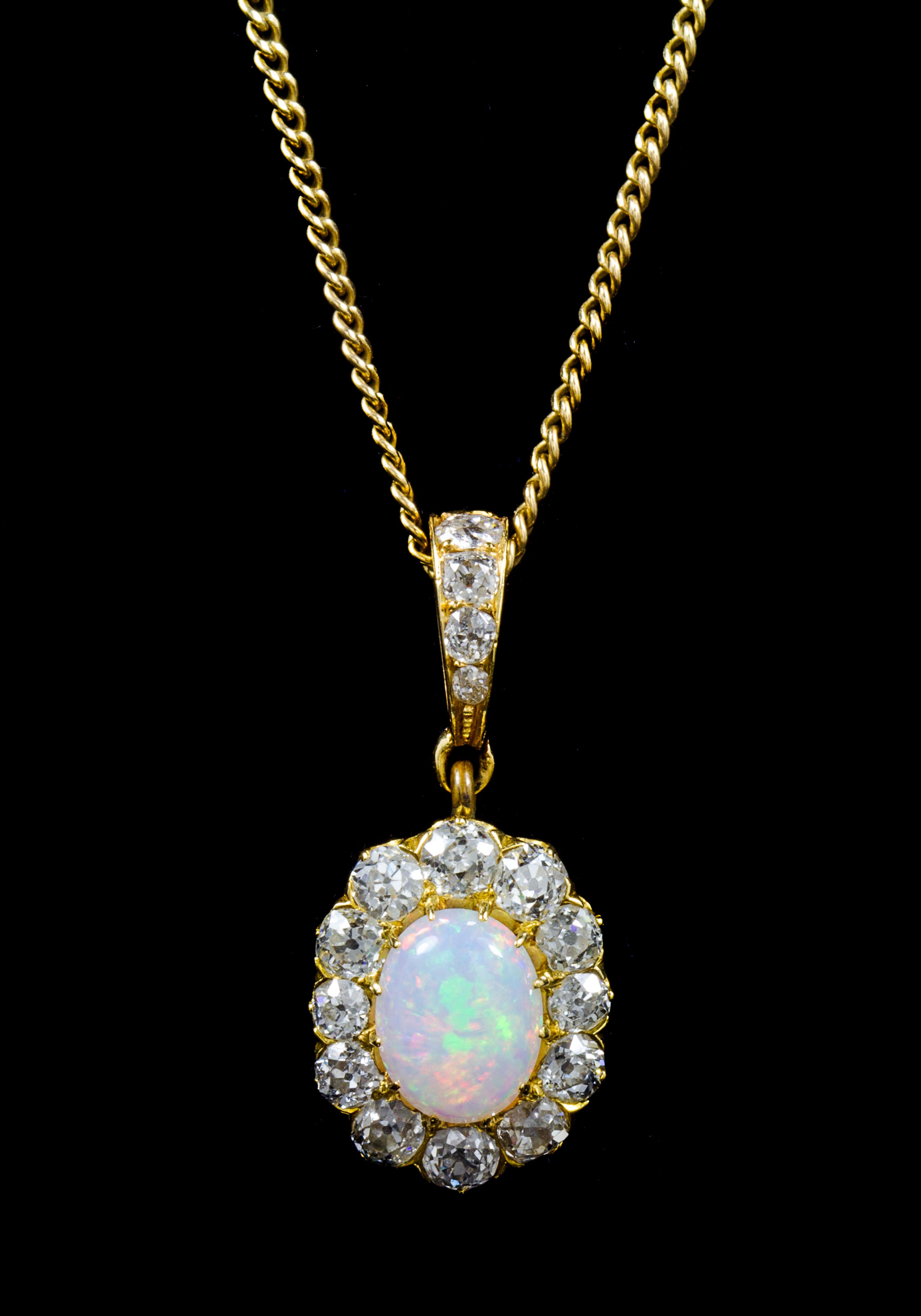 An Edwardian Yellow Gold, Opal and Diamond Pendant, 5.50 dwts.