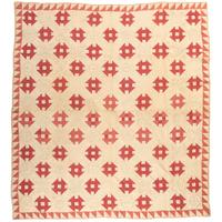 A Monkey Wrench Trapunto Quilt