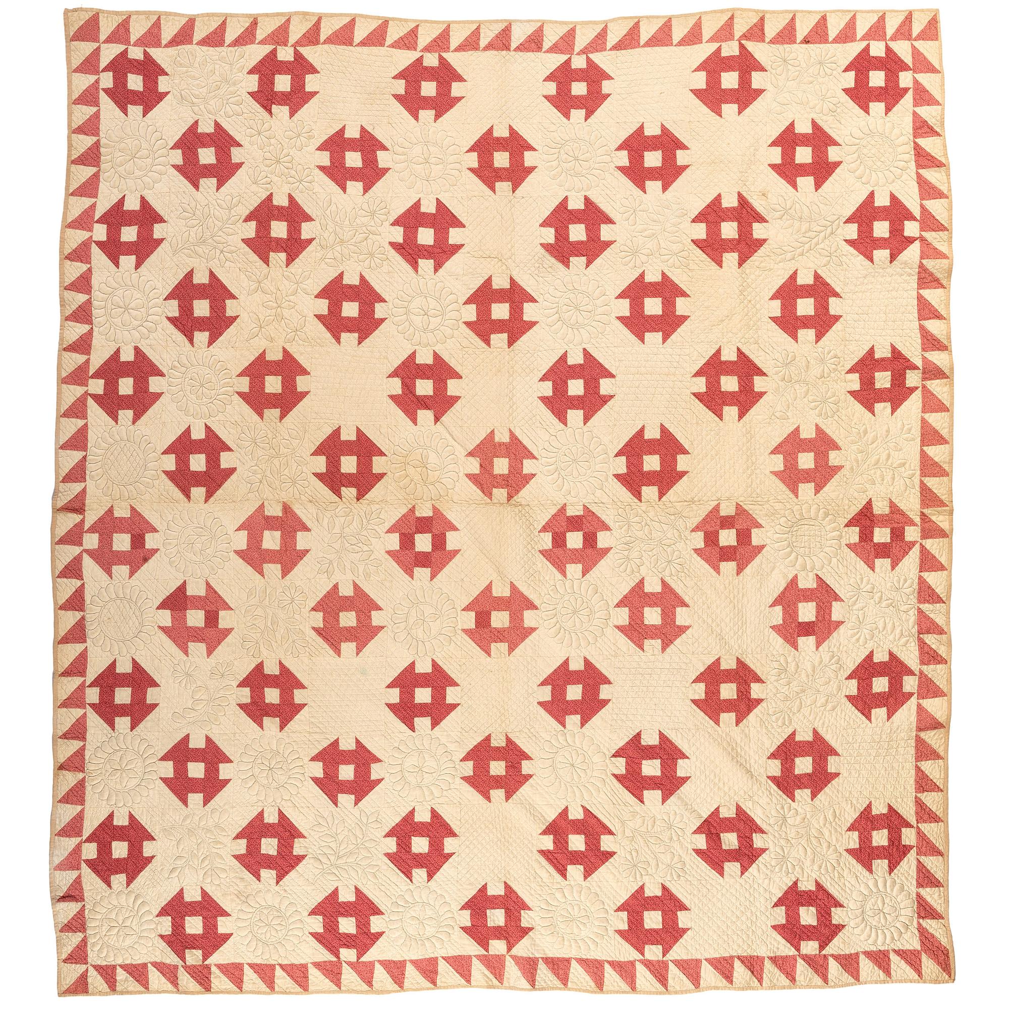A Monkey Wrench Trapunto Quilt