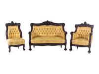 A Karpen Carved Mahogany Three-Piece Parlor Suite