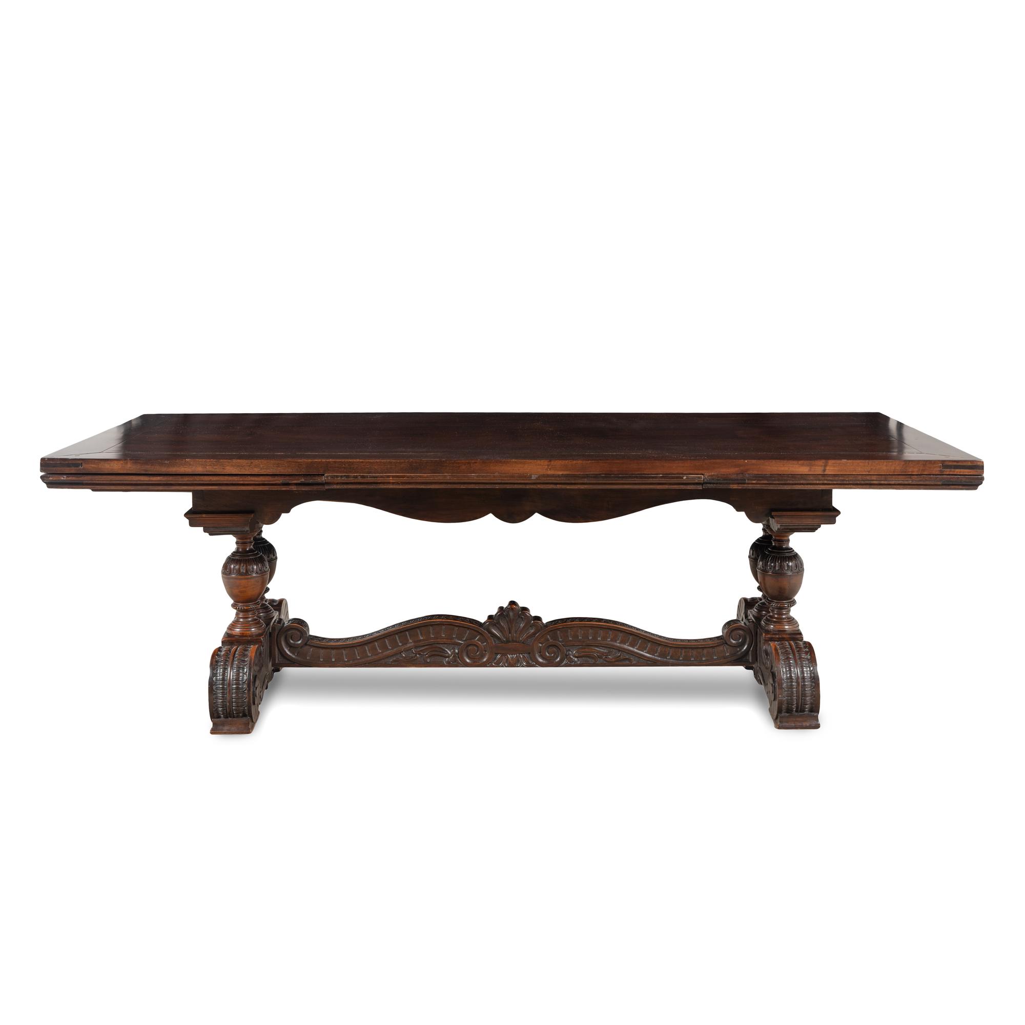 An Italian Renaissance Style Walnut Dining Table