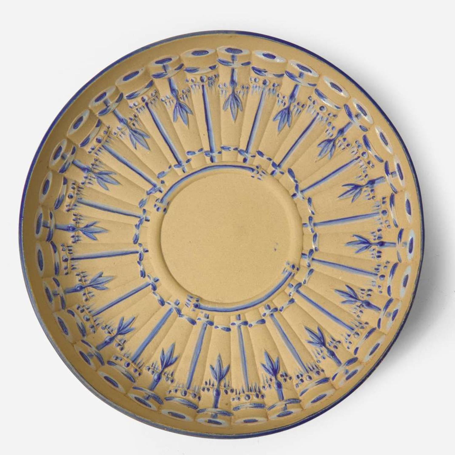 A Wedgwood Encaustic-Decorated Caneware Cup and Saucer UK, circa 1787