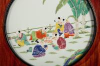 A Set of Four Chinese Famille Rose Porcelain Inset Hardwood Wall Panels