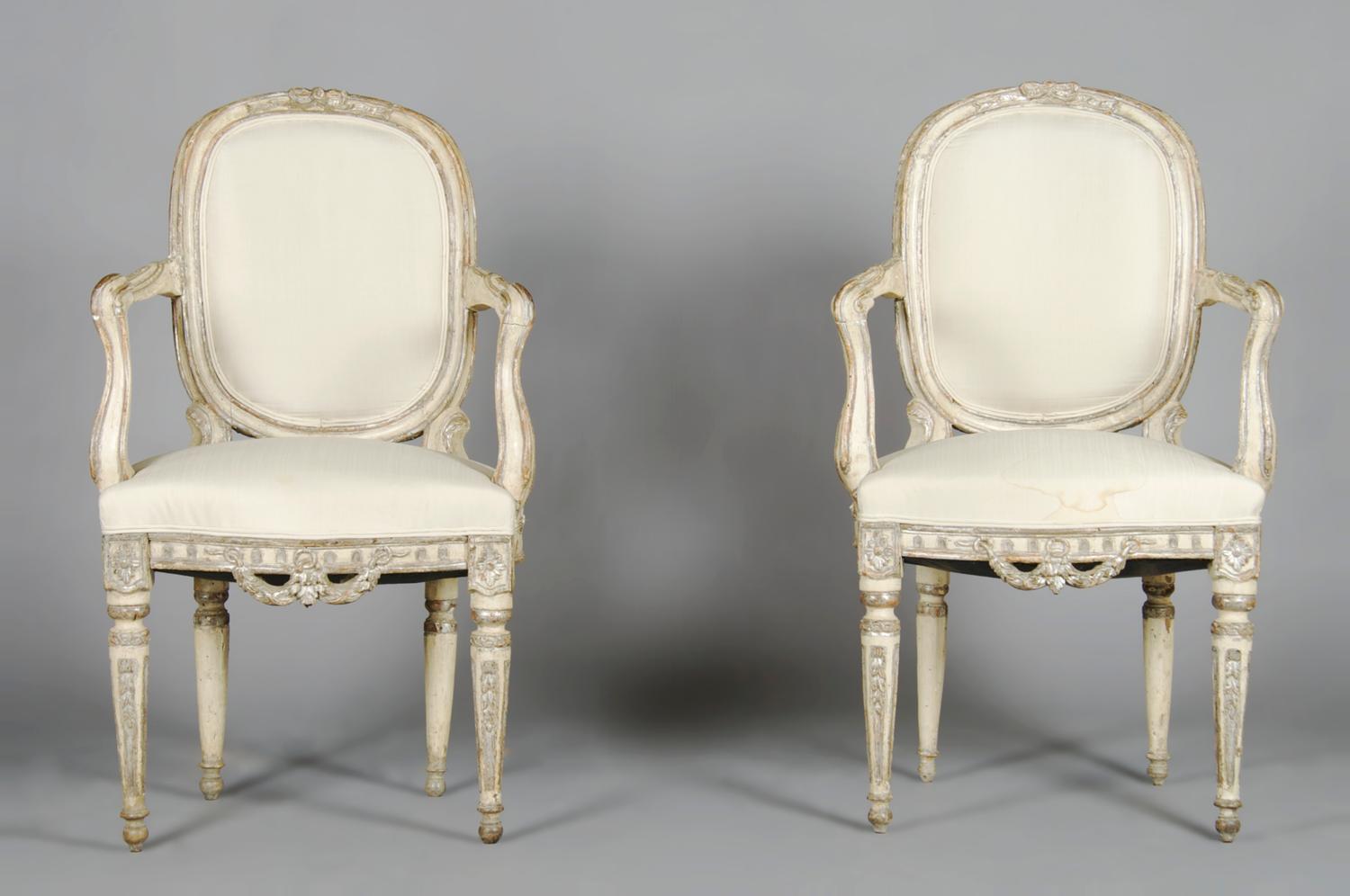 A Pair of Louis XV Style Painted and Parcel Silvered Fauteuil, Height 37 inches.