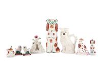 Eight Staffordshire Glazed Earthenware Dogs