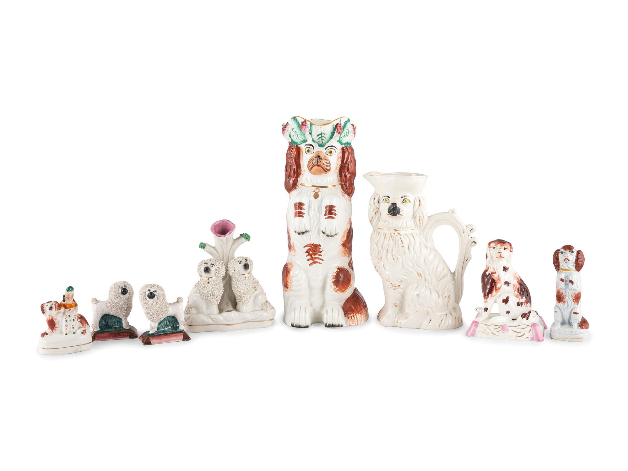 Eight Staffordshire Glazed Earthenware Dogs