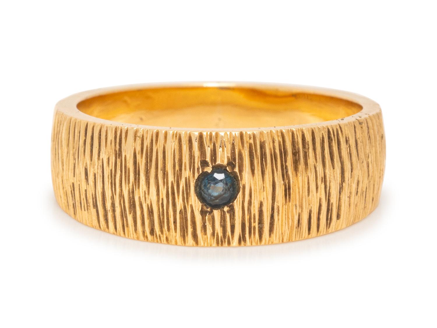A 14 Karat Yellow Gold and Sapphire Ring,