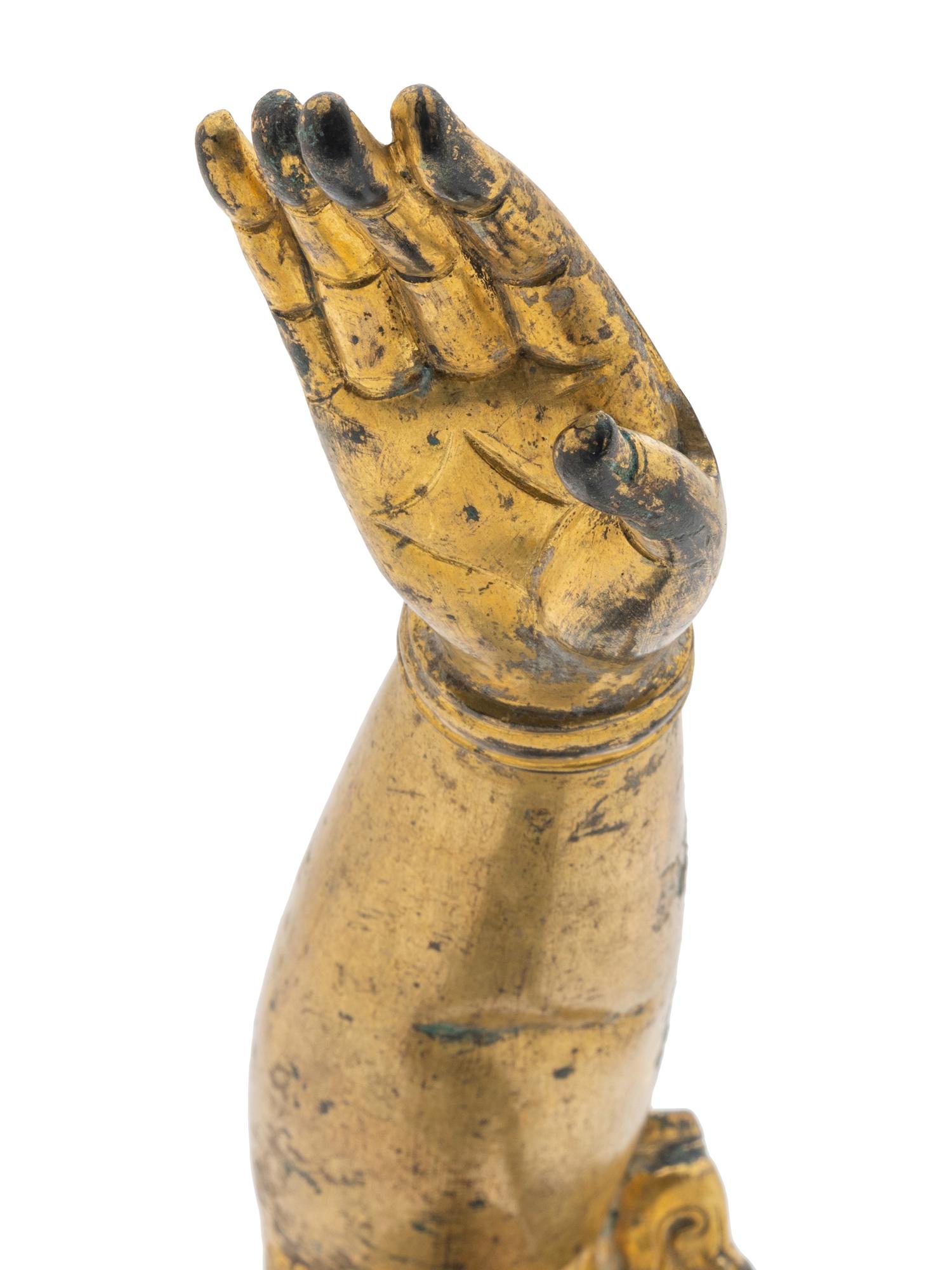 A Chinese Gilt Bronze Buddha Arm