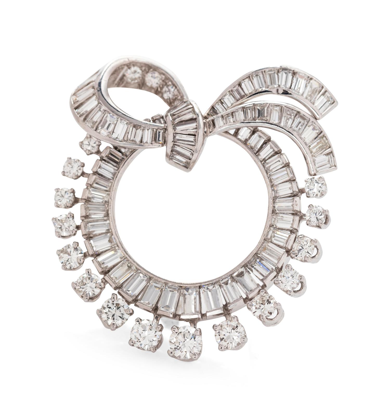 A Platinum and Diamond Circle Brooch,