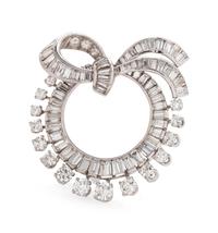 A Platinum and Diamond Circle Brooch,