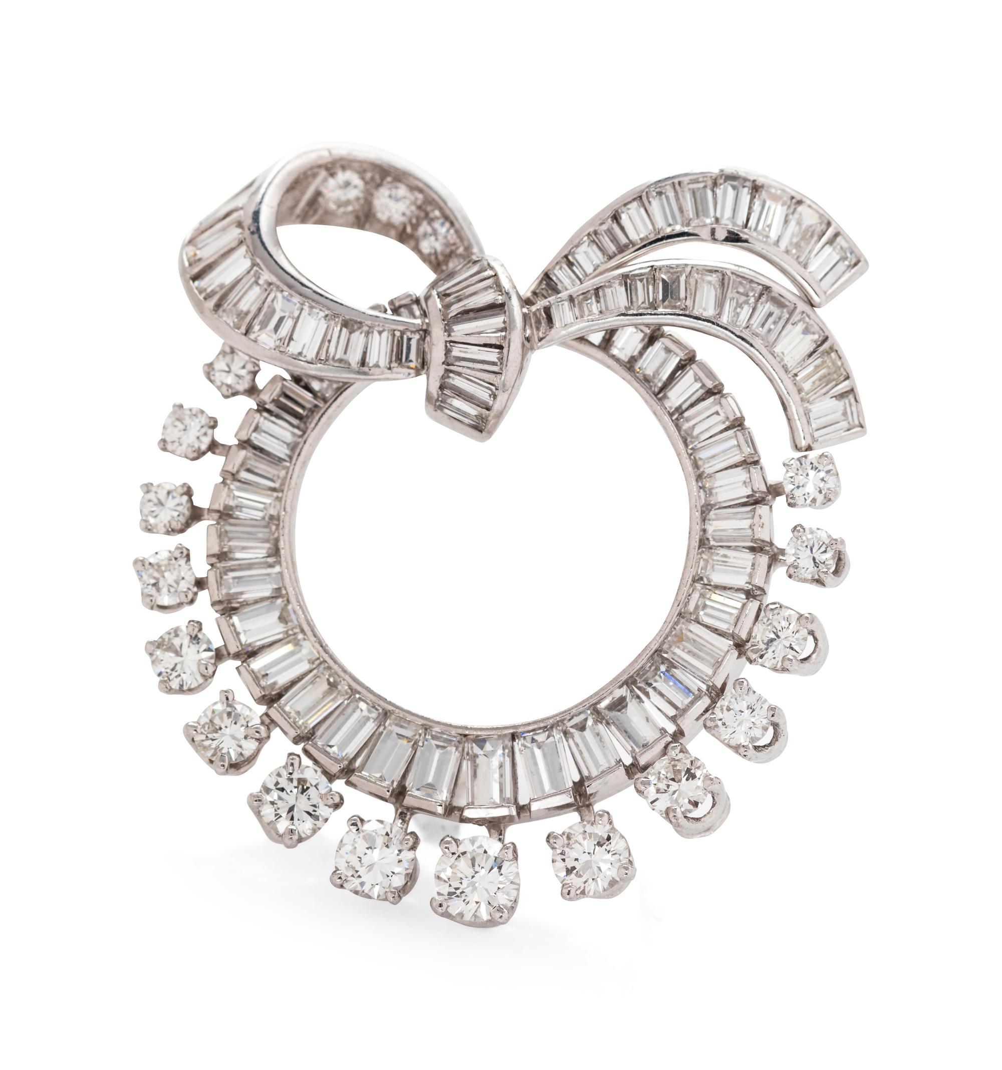 A Platinum and Diamond Circle Brooch,