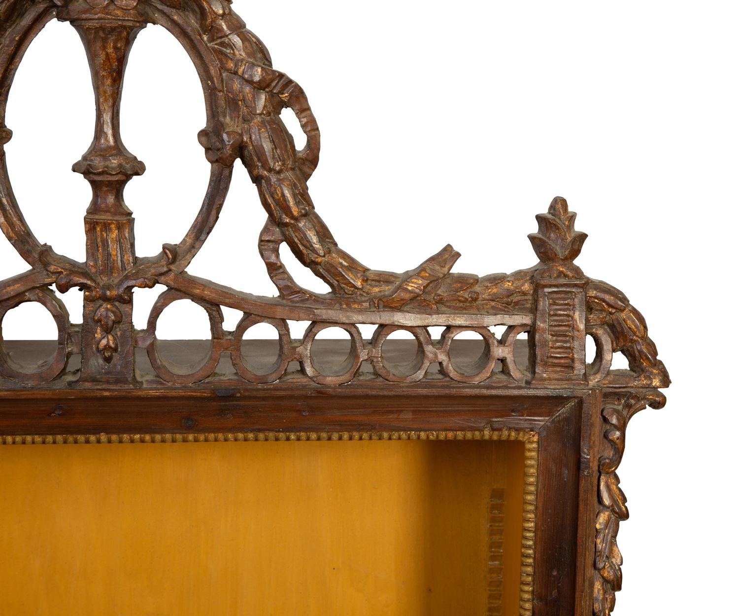 An Italian Louis XVI Style Walnut and Parcel Gilt Hanging Vitrine — 20TH CENTURY
