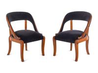 A Pair of Austrian Neoclassical Barrel-Back Slipper Chairs