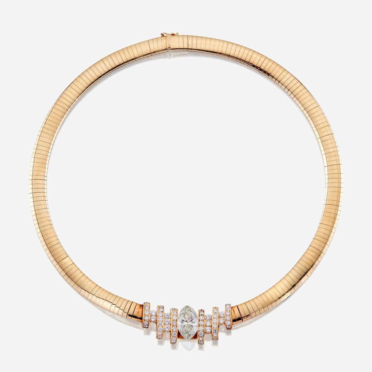 A diamond, eighteen karat gold, and fourteen karat gold necklace