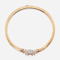A diamond, eighteen karat gold, and fourteen karat gold necklace