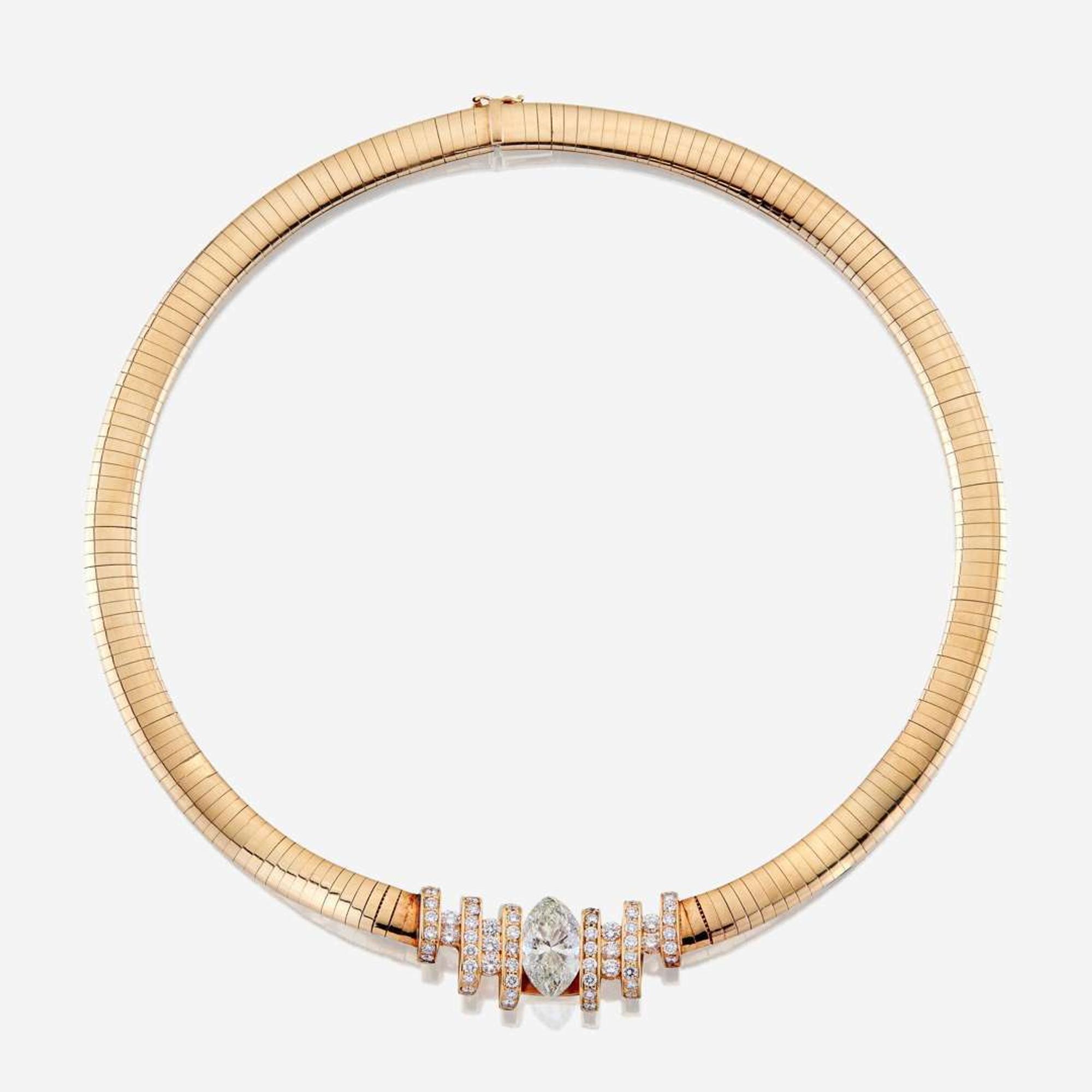 A diamond, eighteen karat gold, and fourteen karat gold necklace