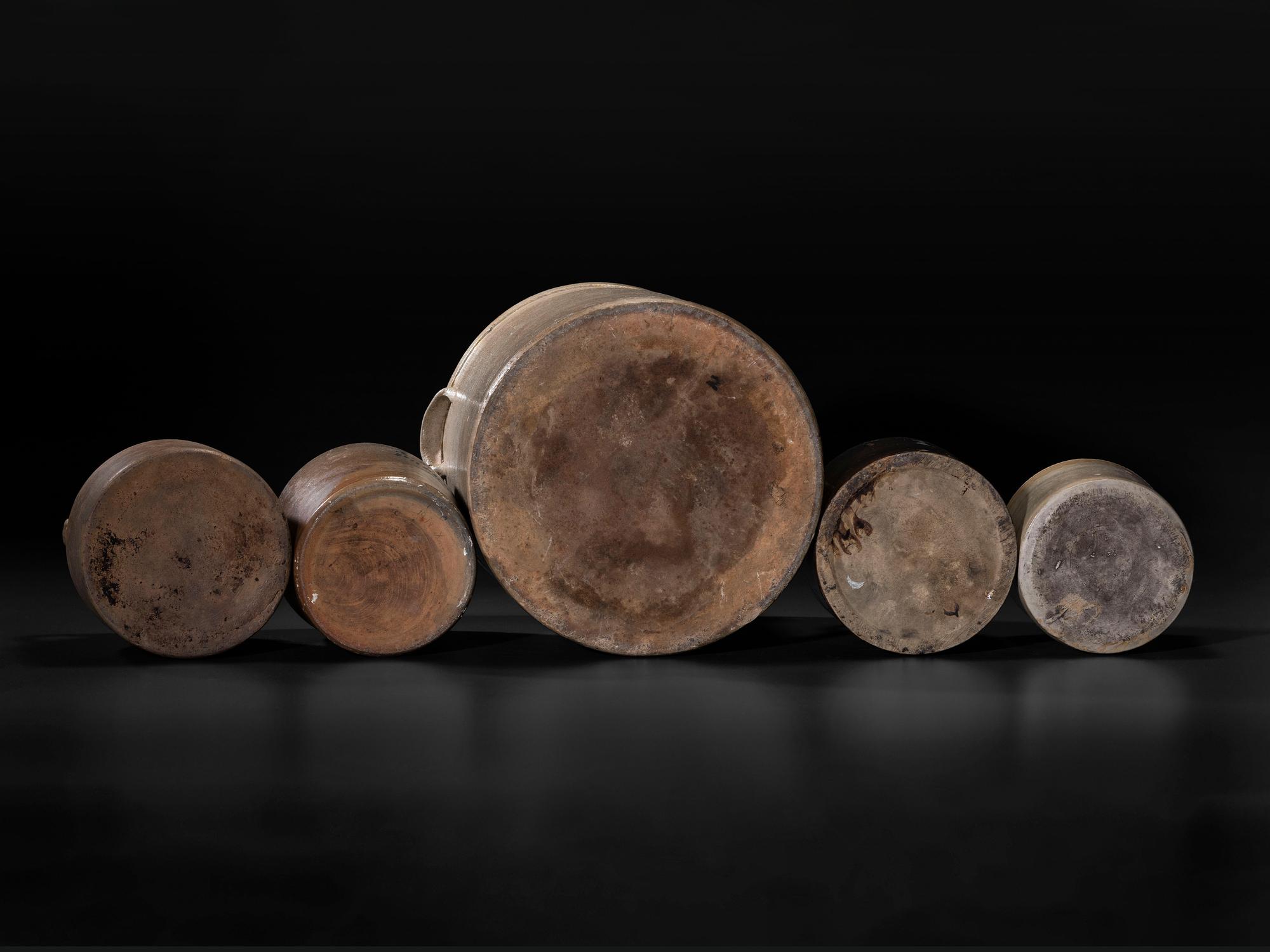 Sixteen Stoneware Vessels