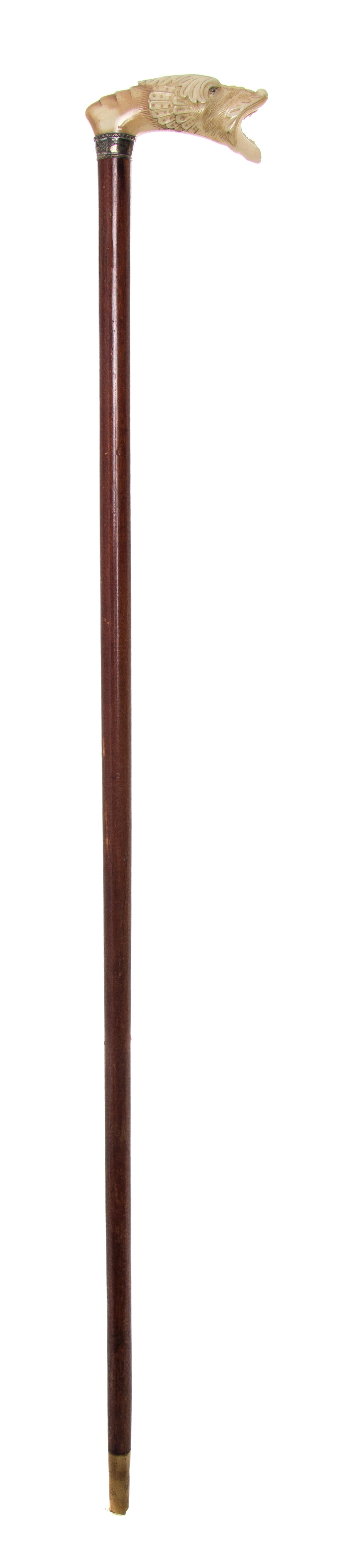 An English Ivory Handled Cane, Length of handle 3 7/8 x length overall 33 3/4 inches.
