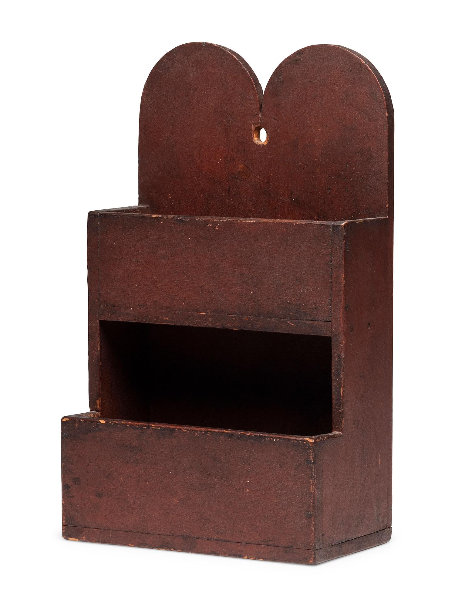 A Queen Anne Carved and Red Painted Pine Hanging Wall Box