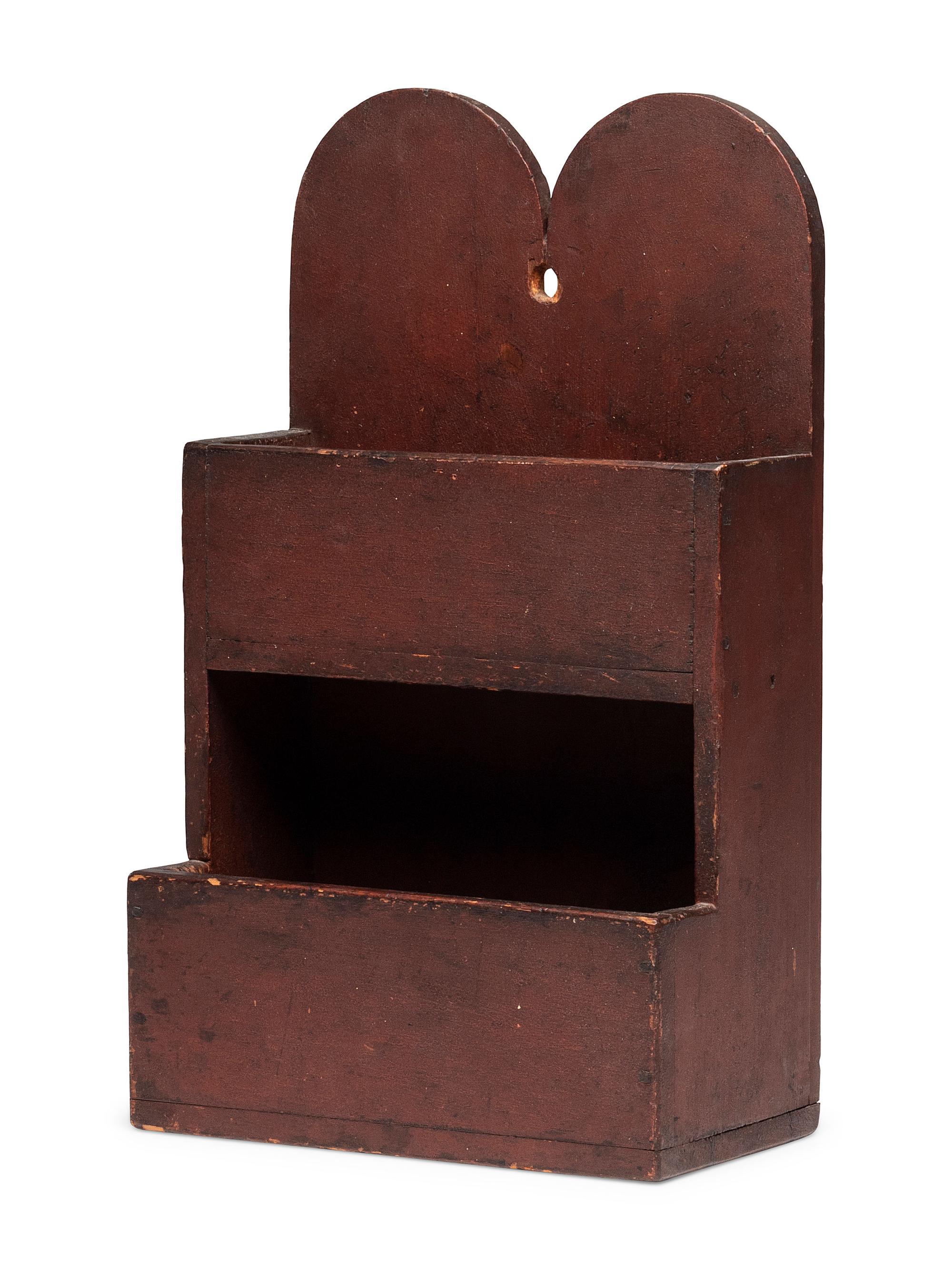 A Queen Anne Carved and Red Painted Pine Hanging Wall Box