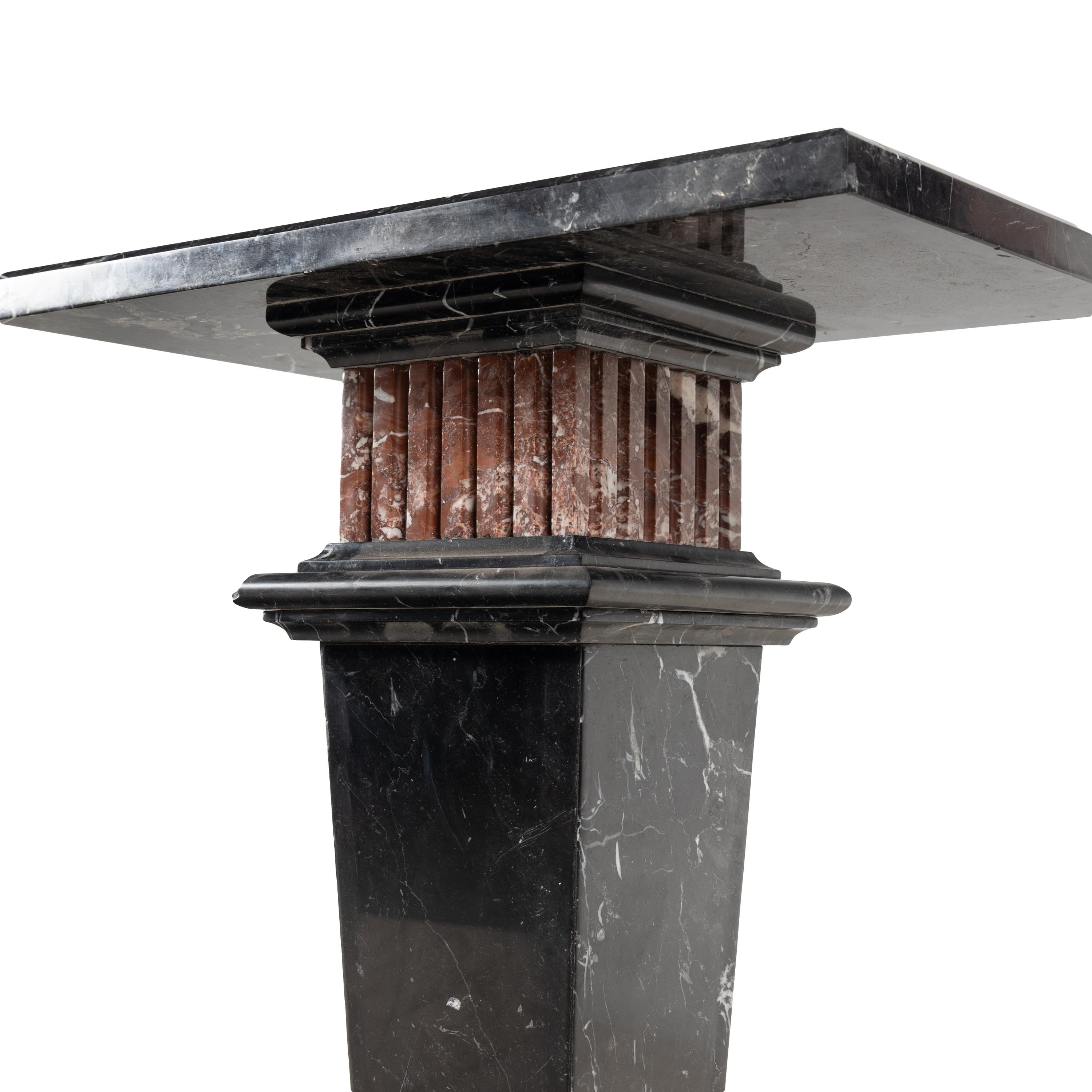 A Nero Marquina and Rosso Francia Marble Pedestal