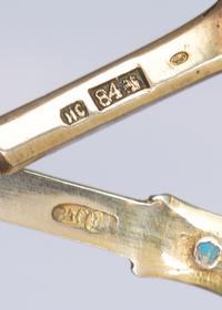 Two Russian Silver-Gilt and Enamel Tea Scoops, One with mark of Ivan Saltykov, Moscow, 19th century, each with polychrome enamels.