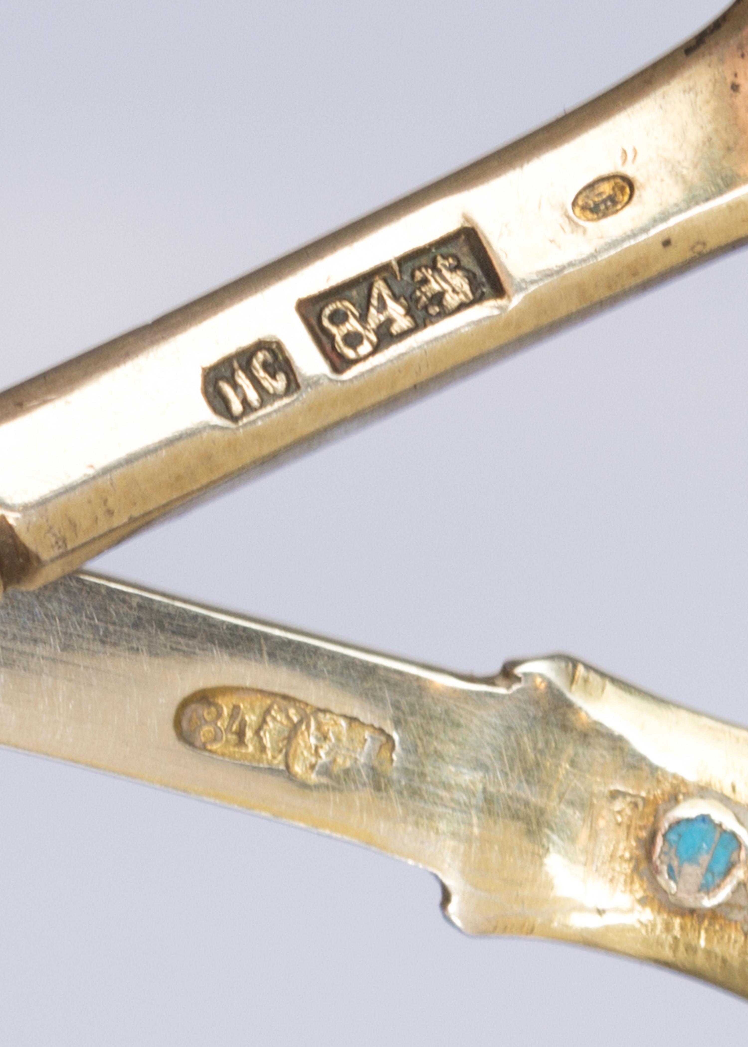 Two Russian Silver-Gilt and Enamel Tea Scoops, One with mark of Ivan Saltykov, Moscow, 19th century, each with polychrome enamels.