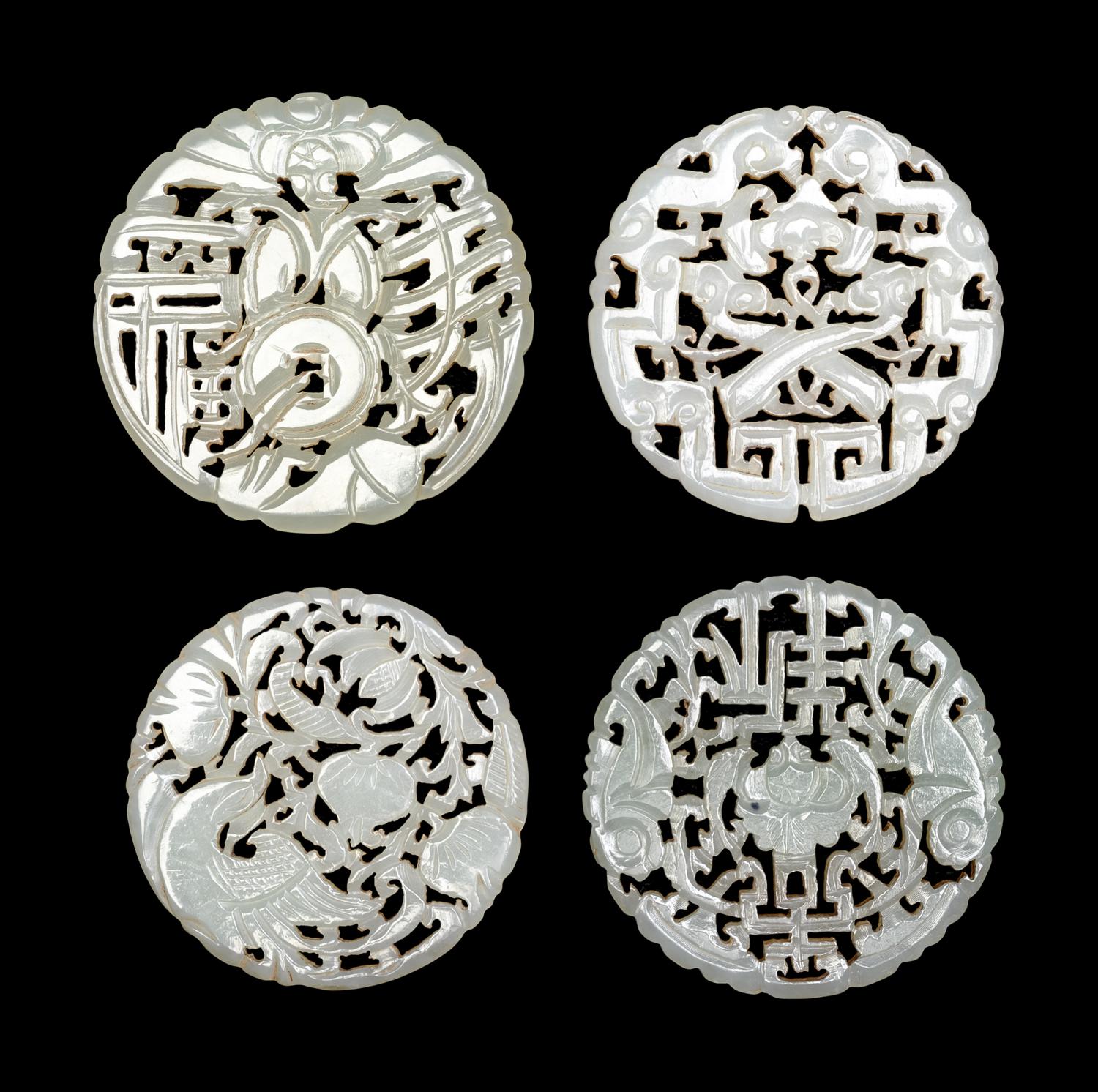 Four Chinese Celadon Jade Reticulated Plaques