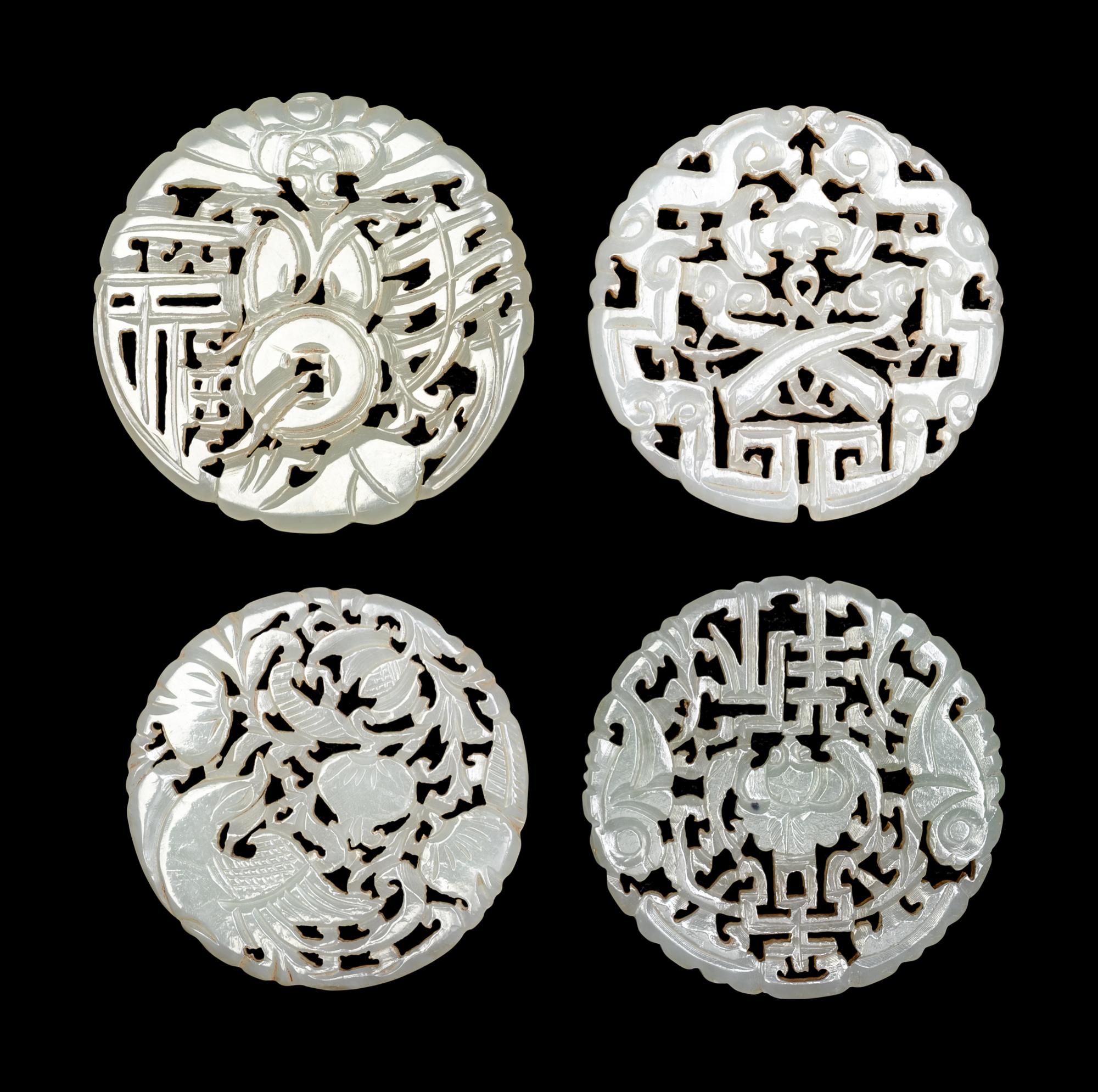 Four Chinese Celadon Jade Reticulated Plaques