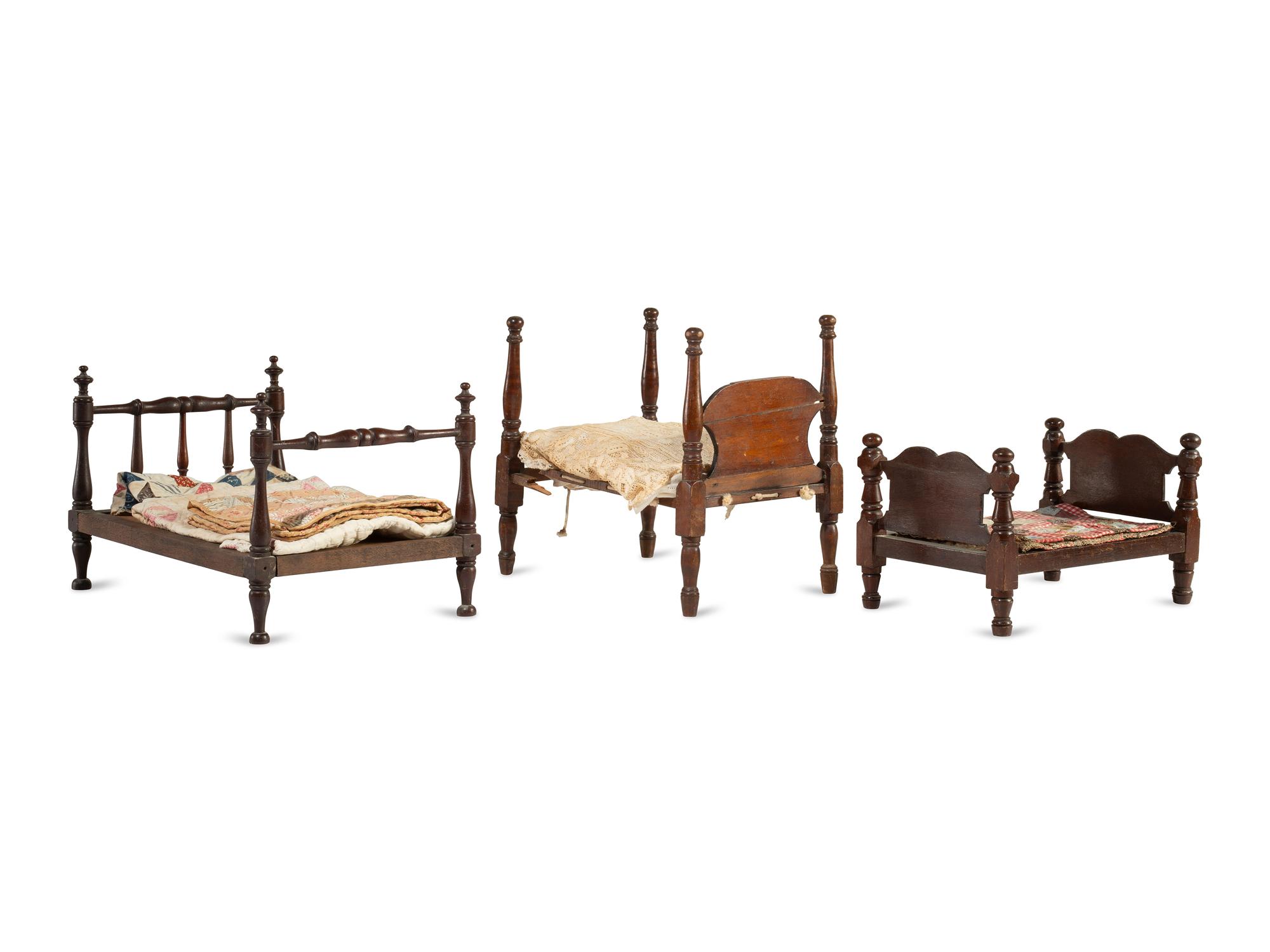 Three Miniature Bedsteads with Quilts