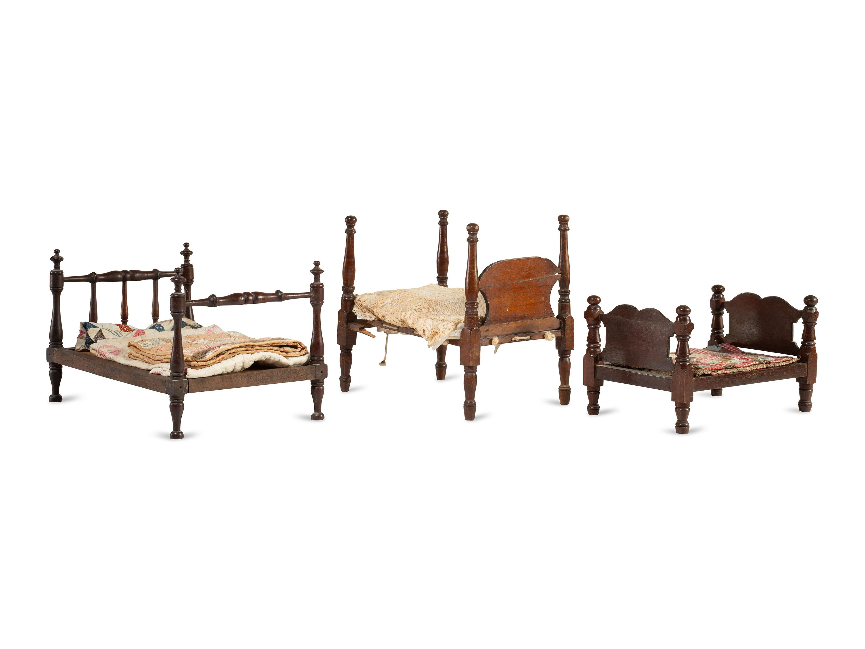 Three Miniature Bedsteads with Quilts