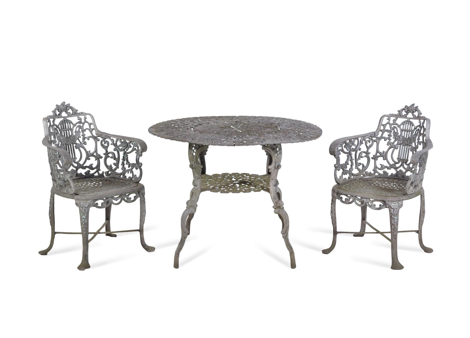 A Set of Three Victorian Style Cast Iron Garden Tables with Twelve Chairs