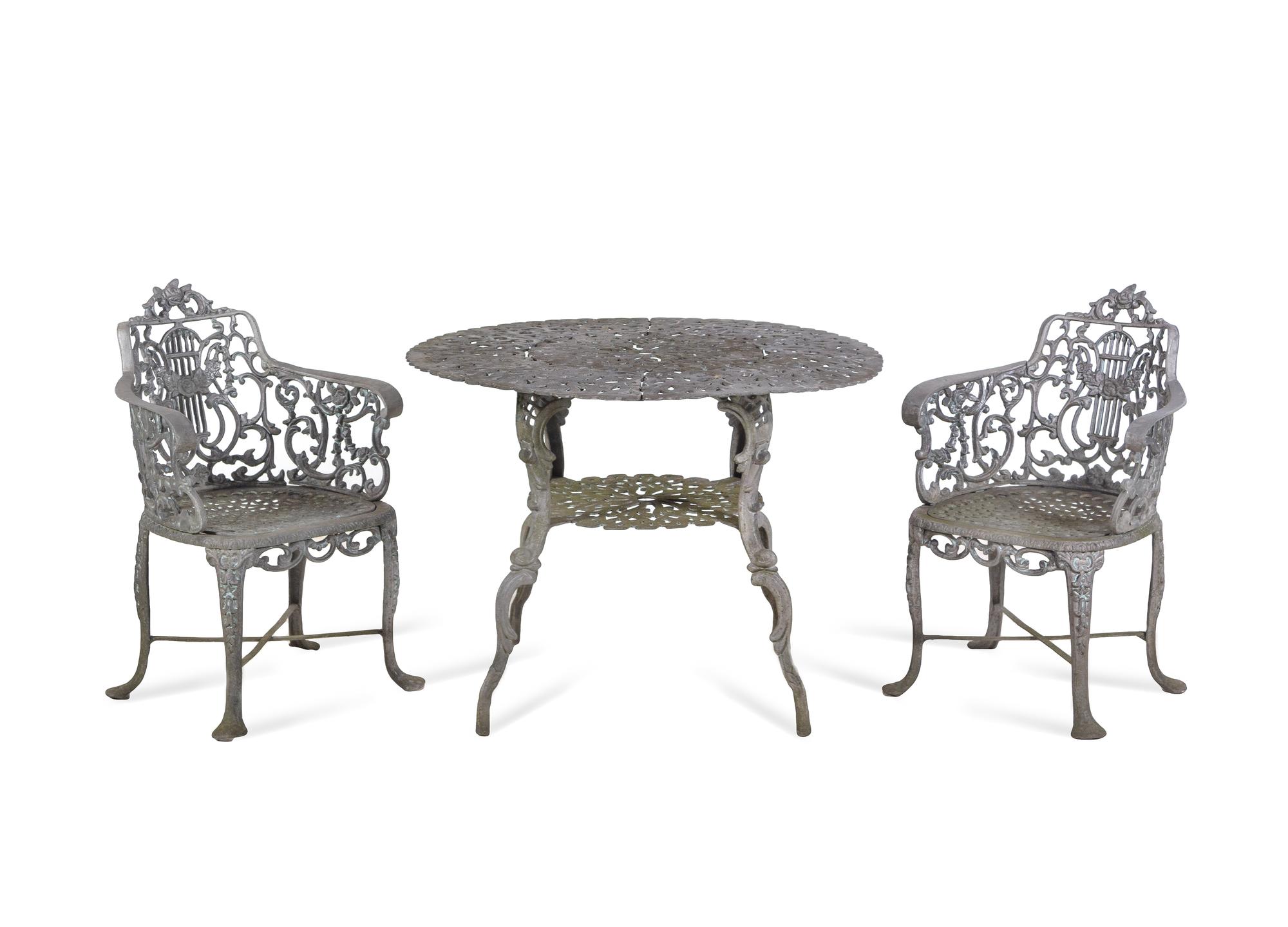 A Set of Three Victorian Style Cast Iron Garden Tables with Twelve Chairs