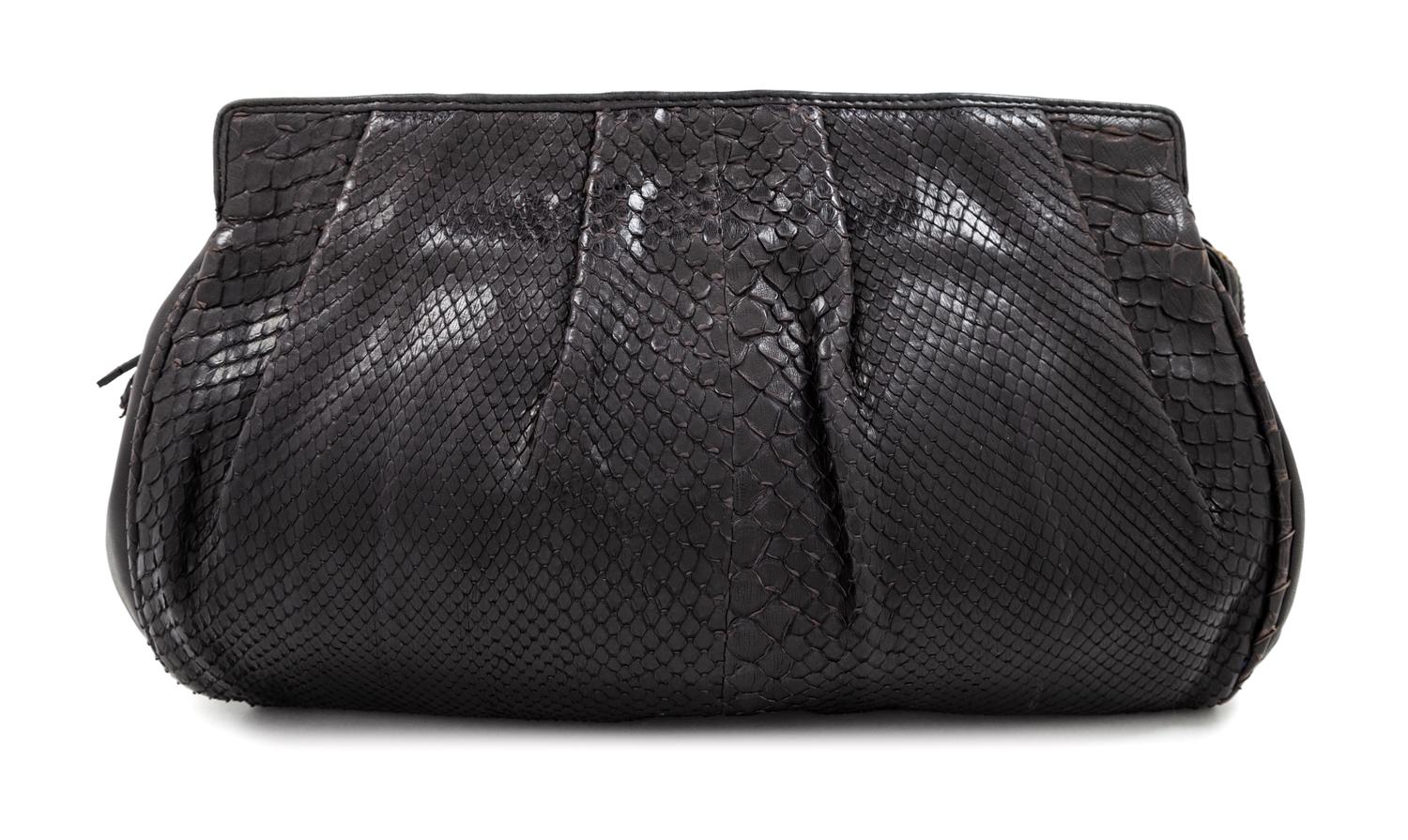 A Bottega Veneta Black Python Clutch, 8" H x 11.25" W x 1.5" D.