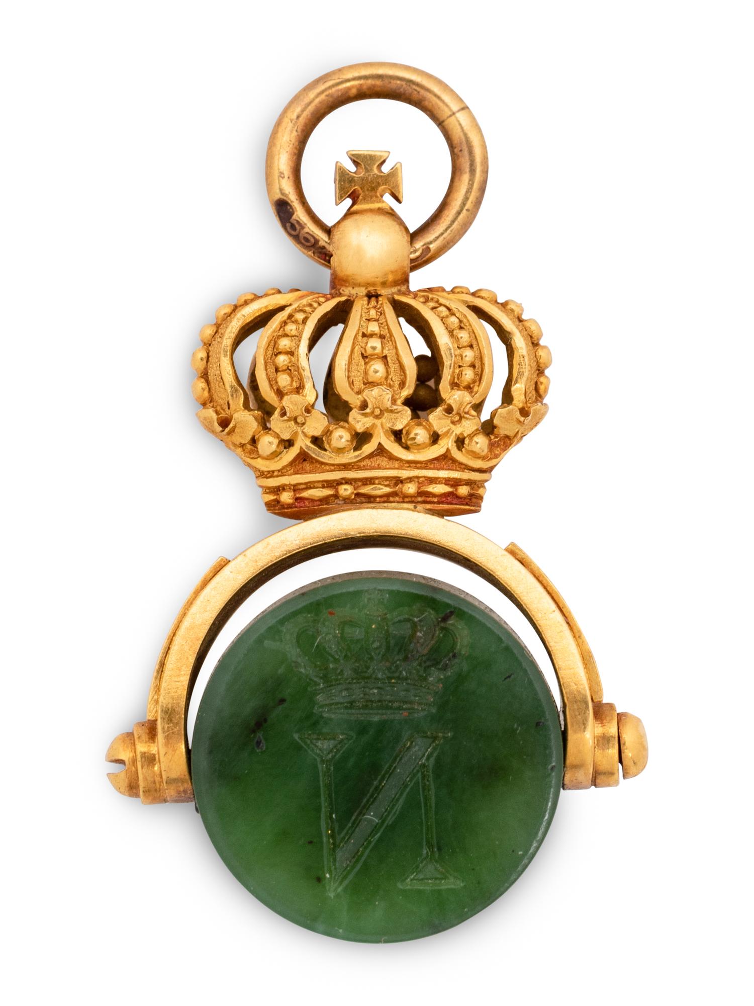 A Russian Yellow Gold and Carved Nephrite Swivel Seal