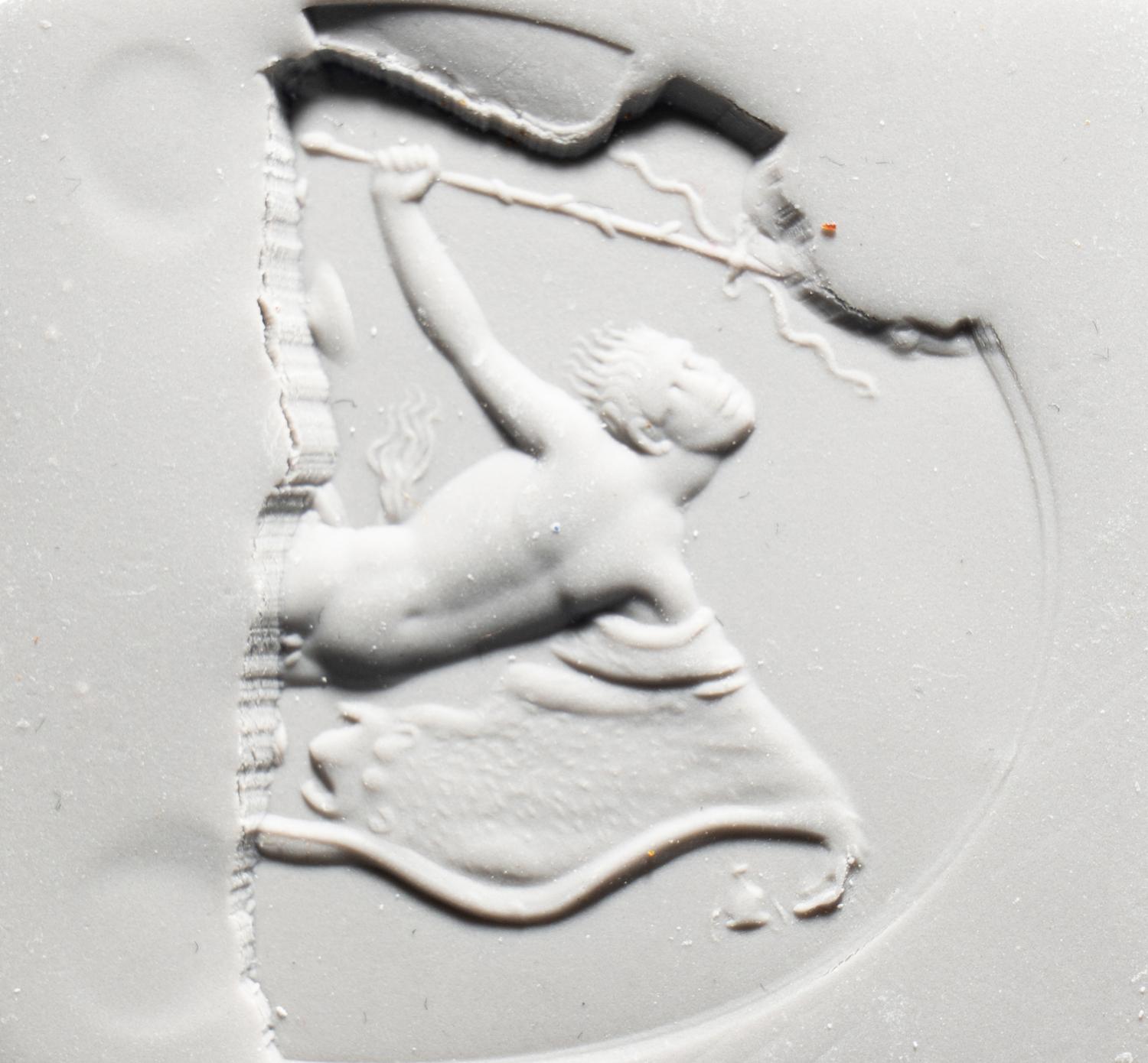 A Roman Carnelian Intaglio Fragment with a Dancing Satyr with the Bacchic Fury