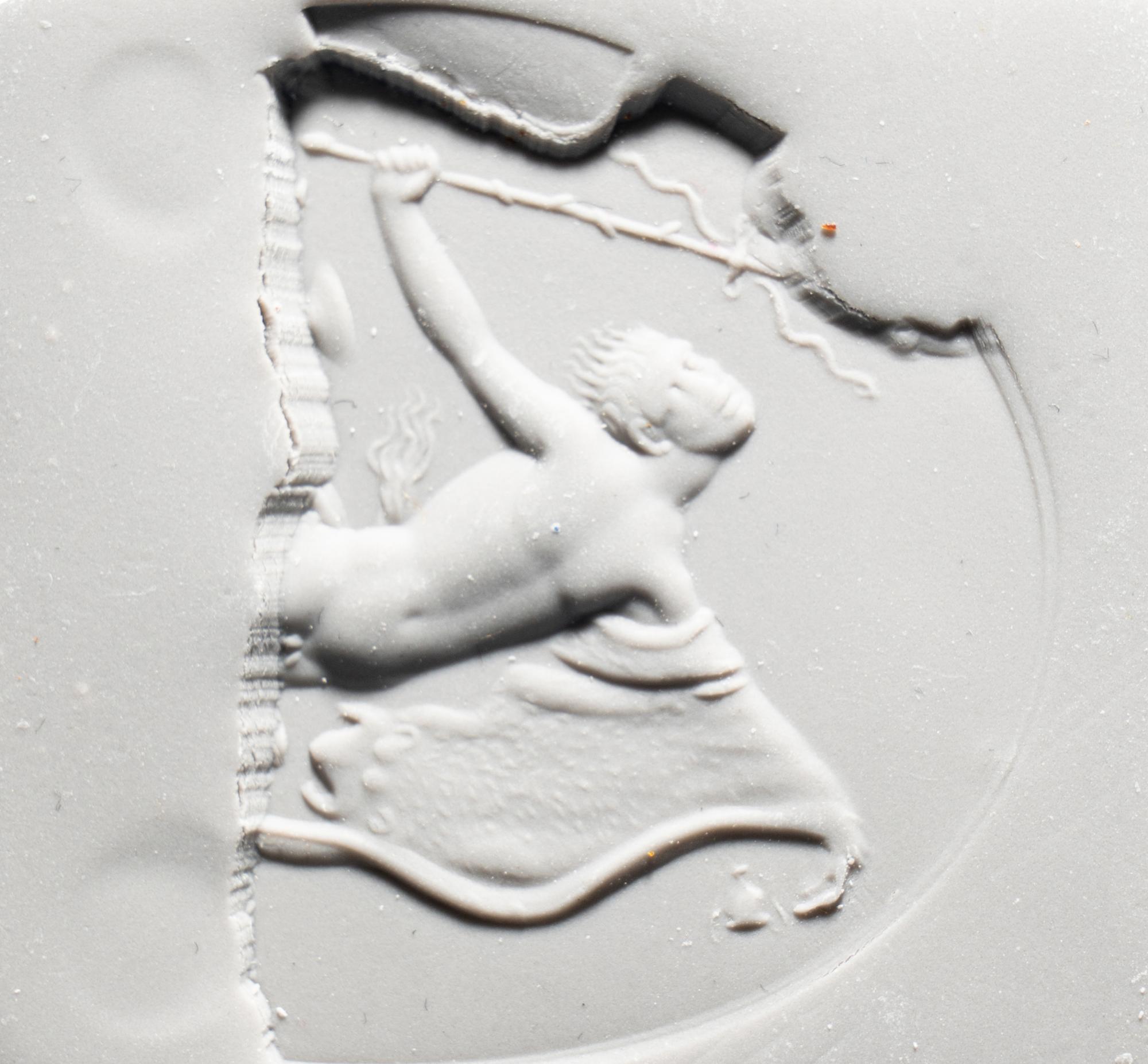 A Roman Carnelian Intaglio Fragment with a Dancing Satyr with the Bacchic Fury