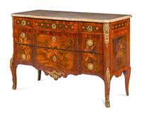 A Louis XV/XVI Transitional Style Gilt Metal Mounted and Sans Traverse Marquetry Marble-Top Commode