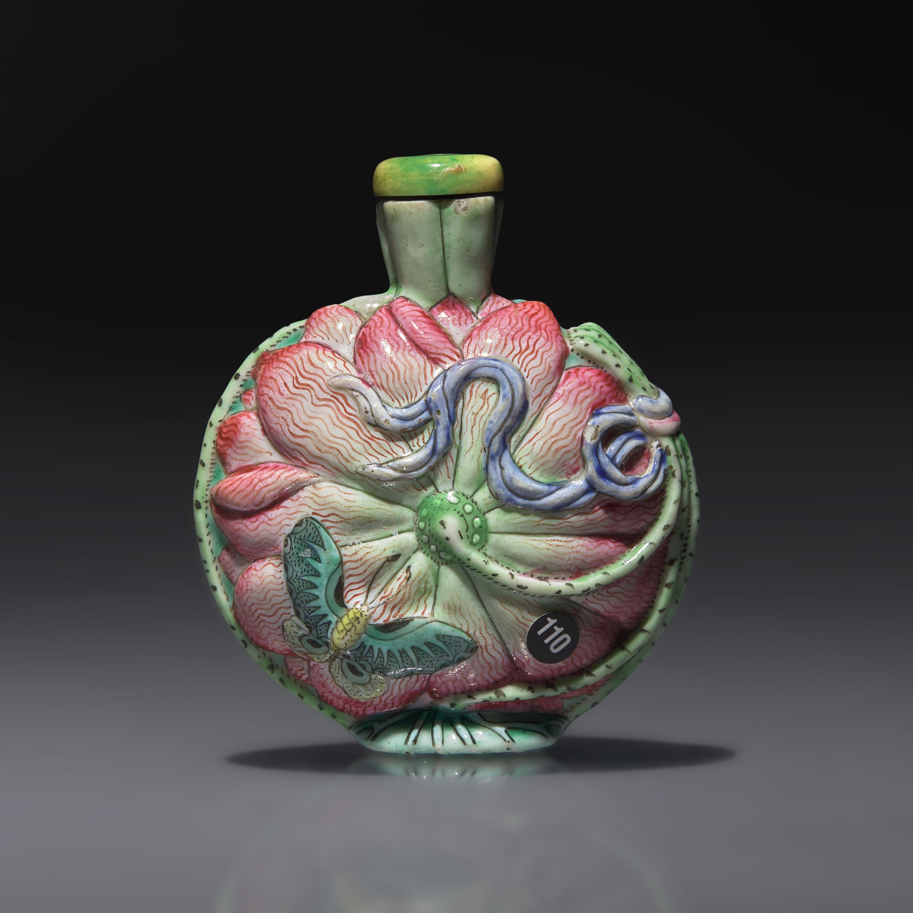 A Chinese Molded and Enameled Porcelain "Lotus and Butterflies" Snuff Bottle, Qing Dynasty, Circa 1780-1850 — 1780-1850年 粉彩模印荷葉蝴蝶紋鼻煙壺