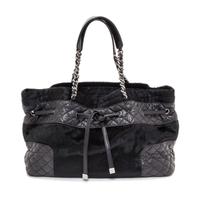 A Chanel Black Pony Hair Drawstring Tote Bag, 14" x 9" x 5".