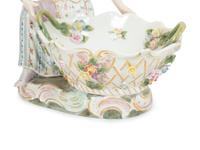 A Pair of Dresden Porcelain Figural Sweetmeat Dishes