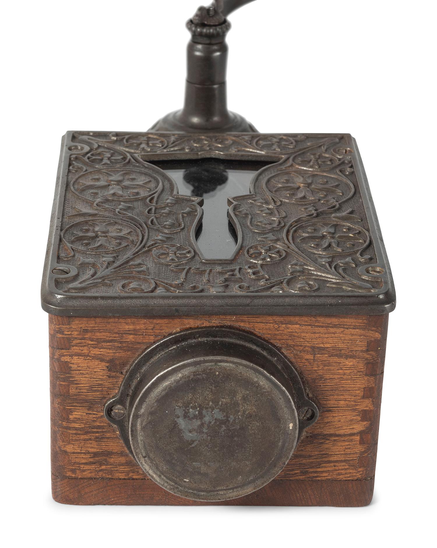 A Bell Cast Iron Wall Mount Coffee Grinder