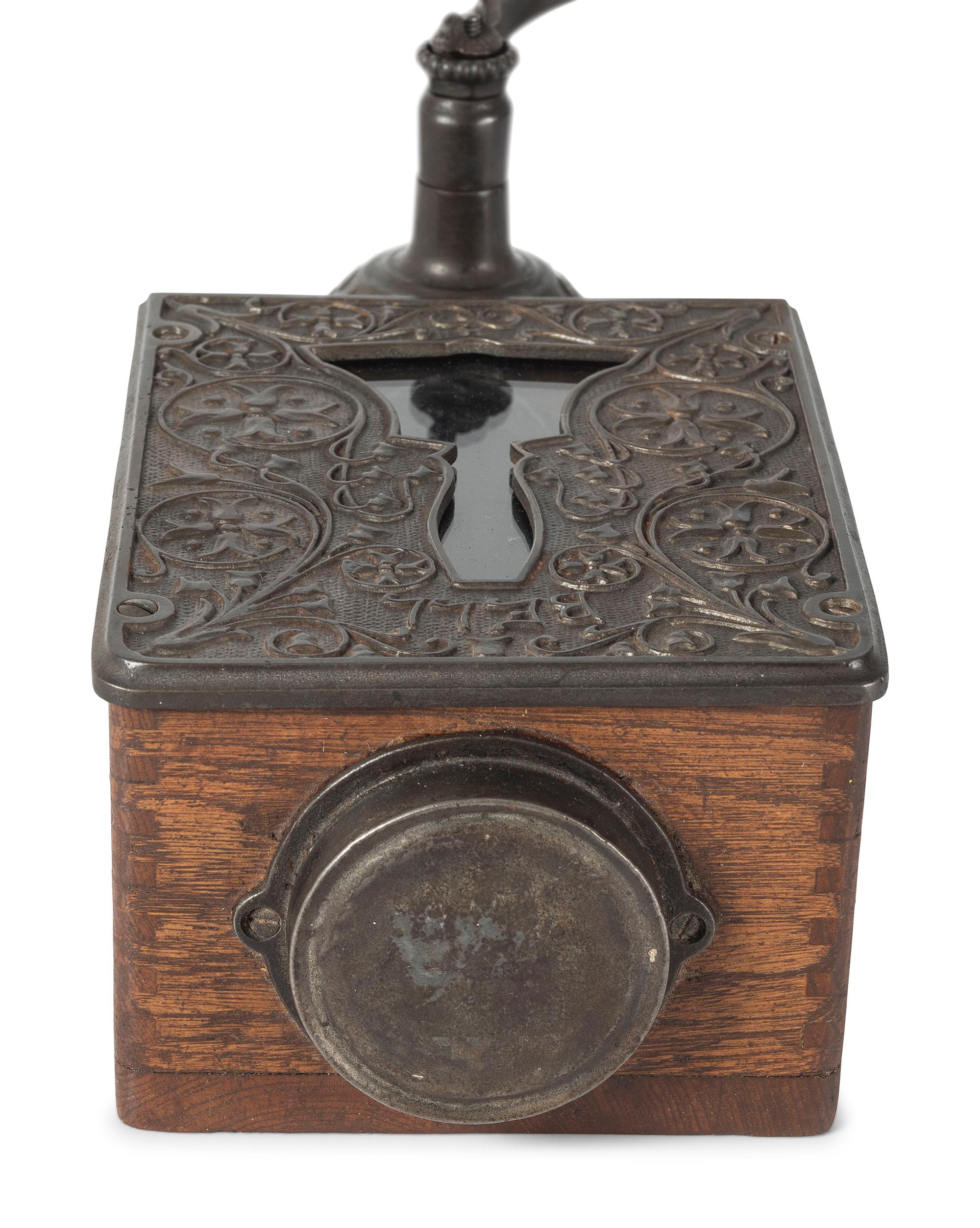 A Bell Cast Iron Wall Mount Coffee Grinder