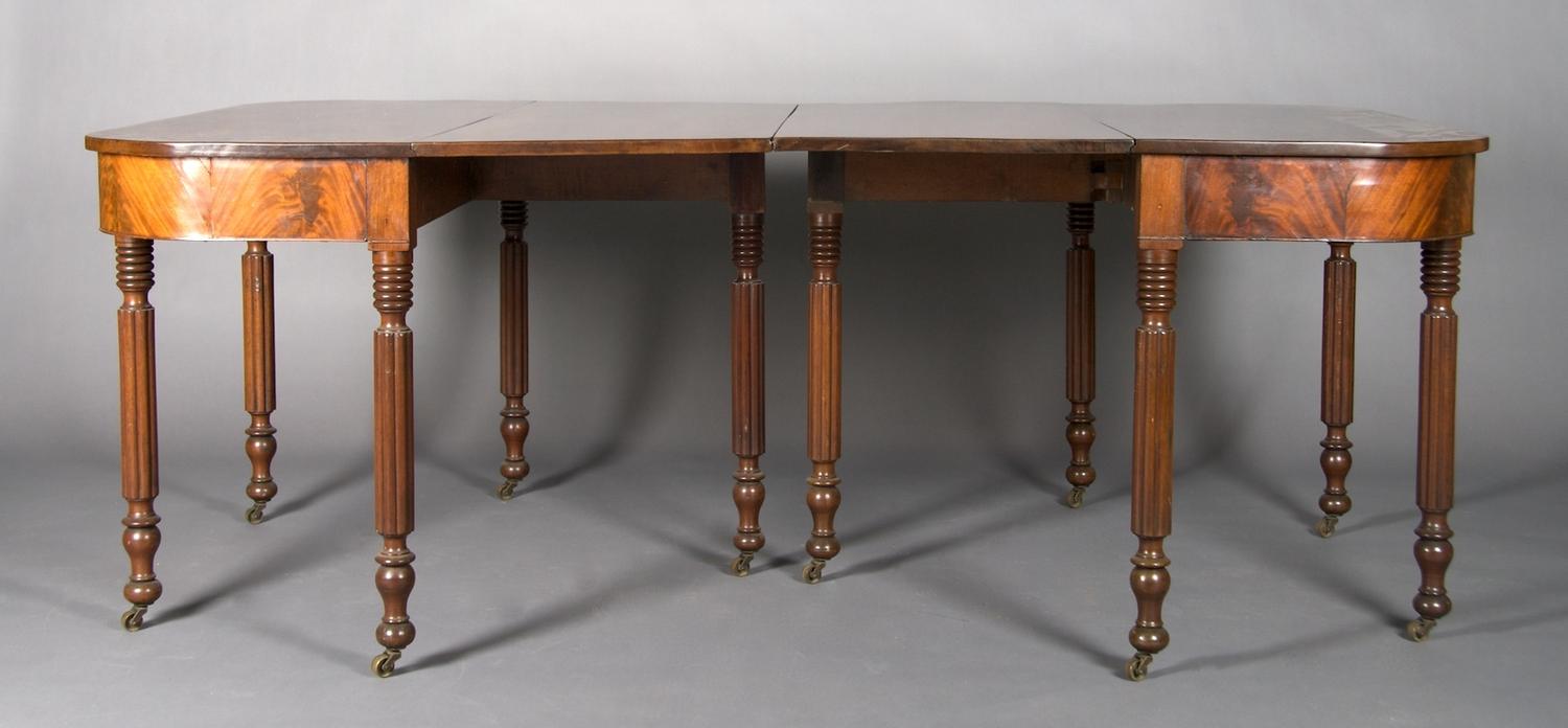 An American Mahogany Drop-Leaf Dining Table, Height 29 1/2 x width 48 x depth 21 inches each.
