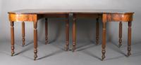 An American Mahogany Drop-Leaf Dining Table, Height 29 1/2 x width 48 x depth 21 inches each.