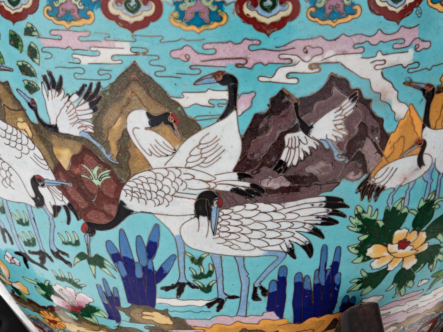 A Pair of Chinese Cloisonné Urns on Wood Stands