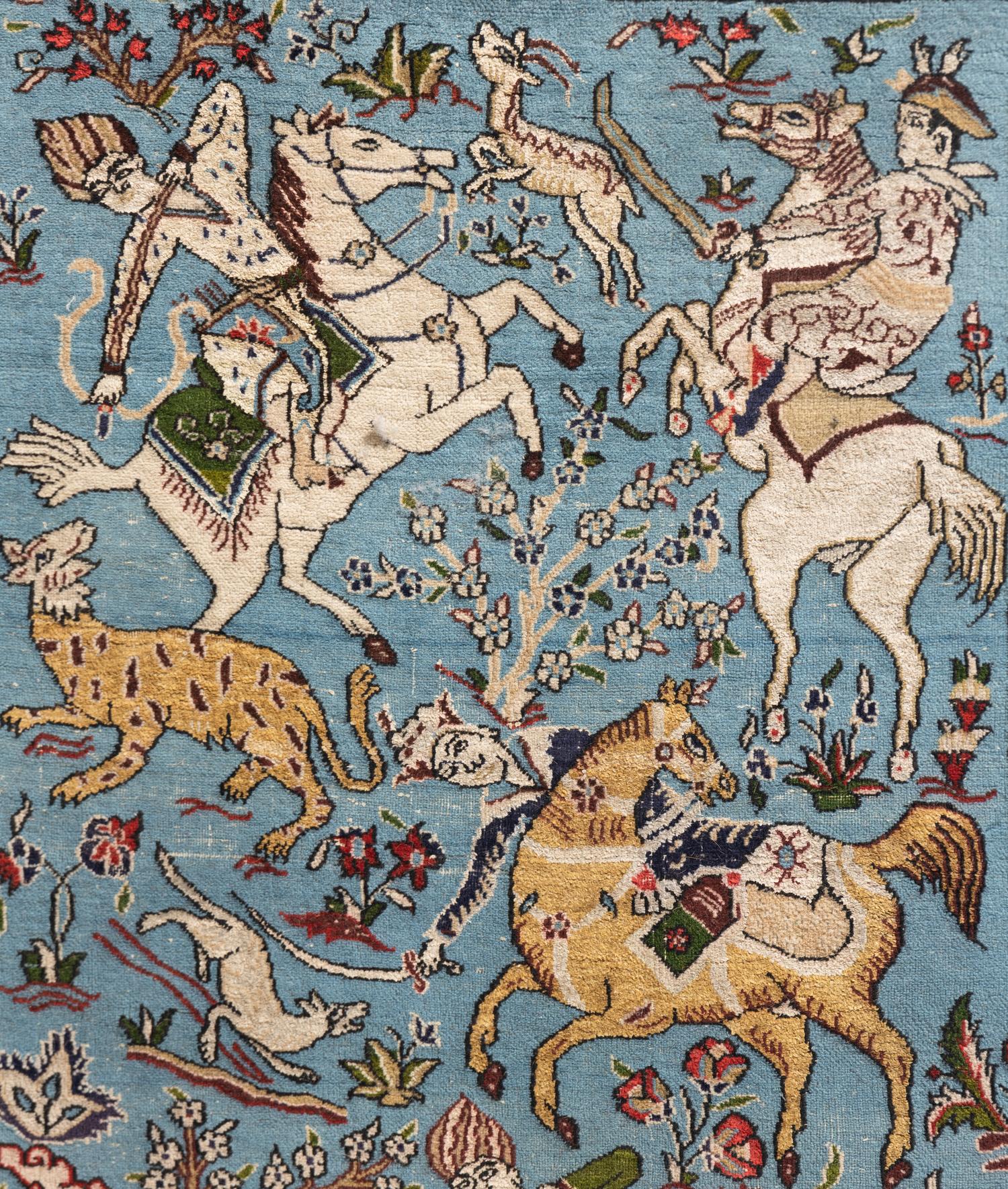 A Kashan Hunting Scene Wool Rug
